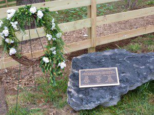 Wreath and memorial plaque